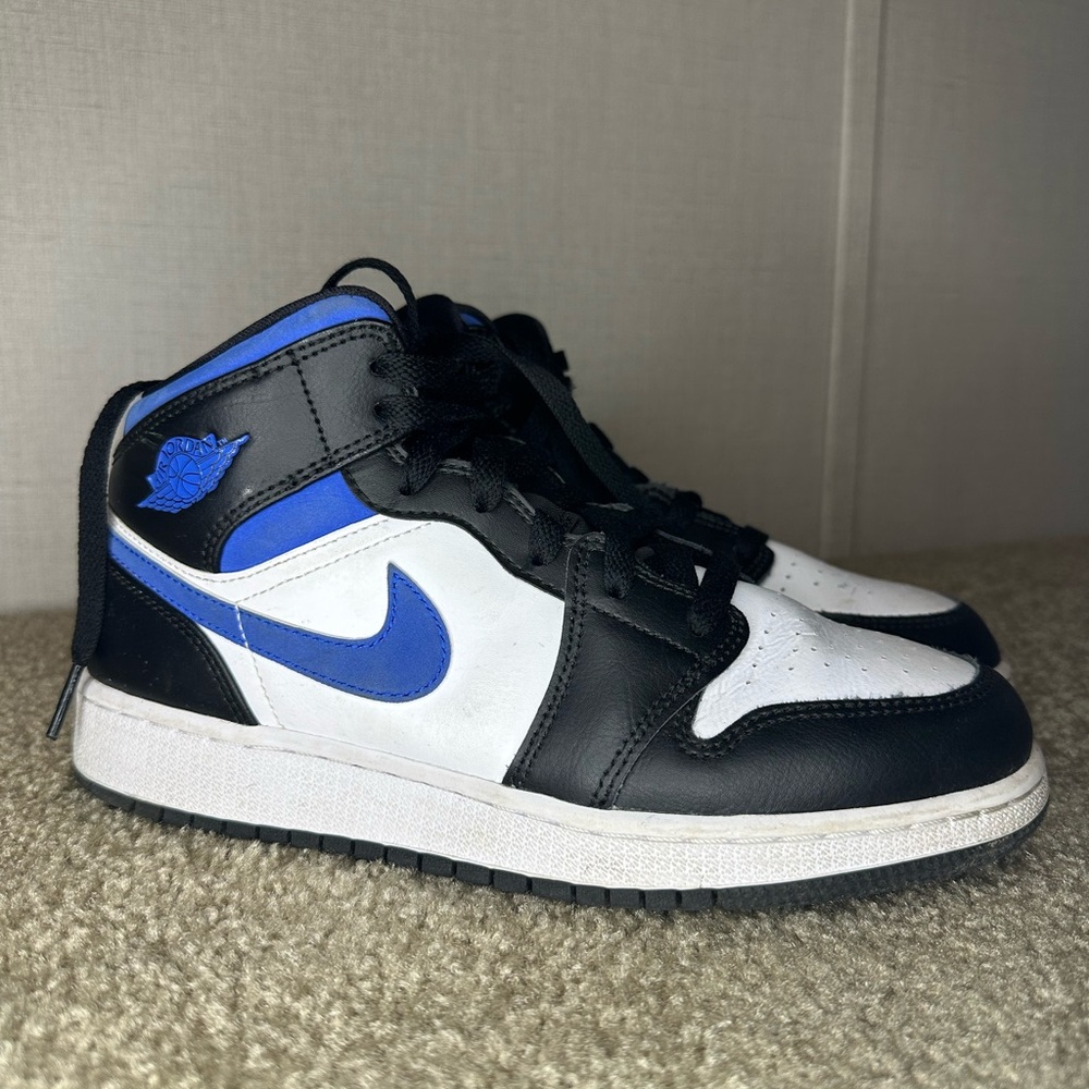 SOLD!! 
Jordan Kids Black and Blue Sneakers